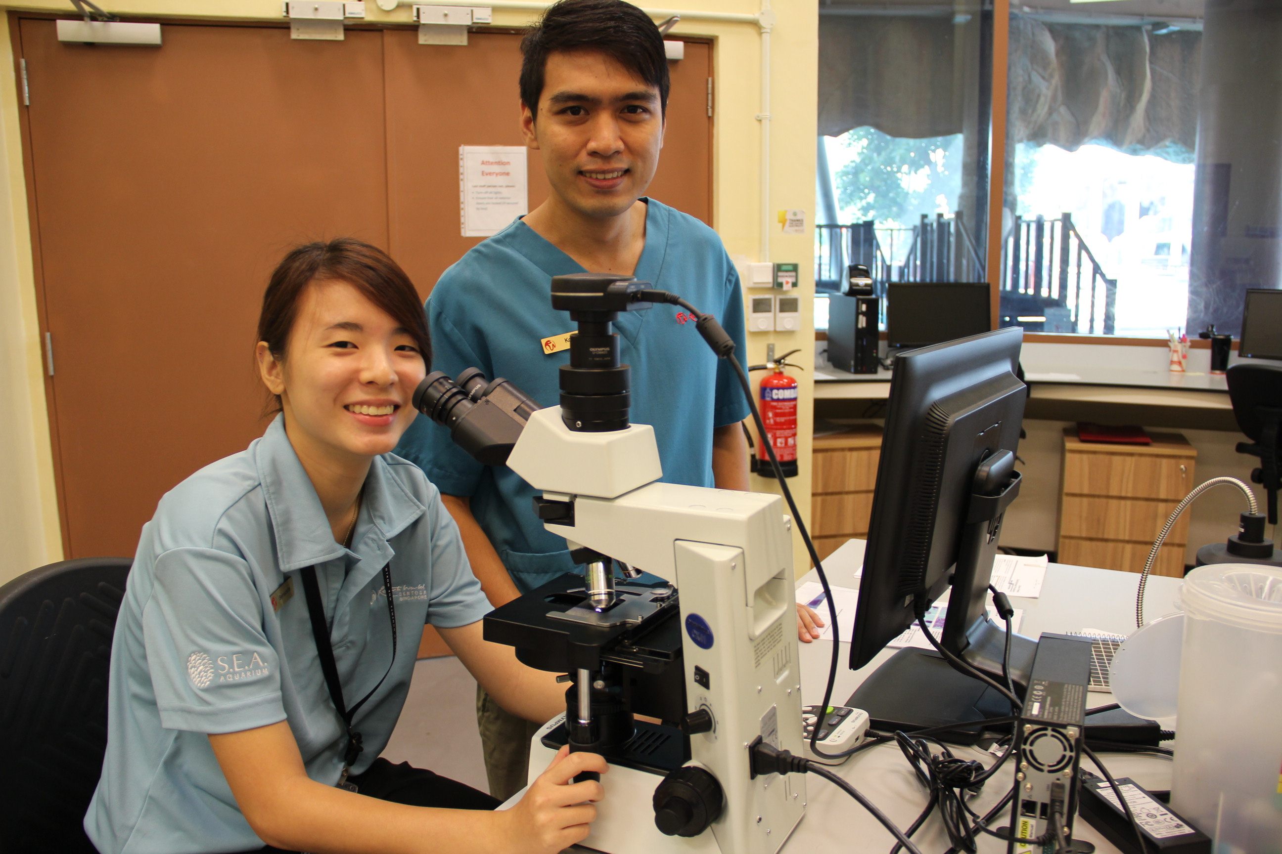 Trainee vet Bernadette Lee and her mentor, Dr Komsin.