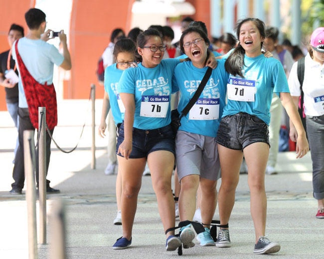 The three-legged race proved a challenge for most participants.